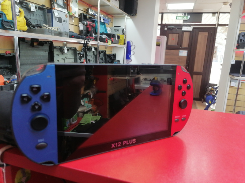 Игровая приставка  X12 PLUS