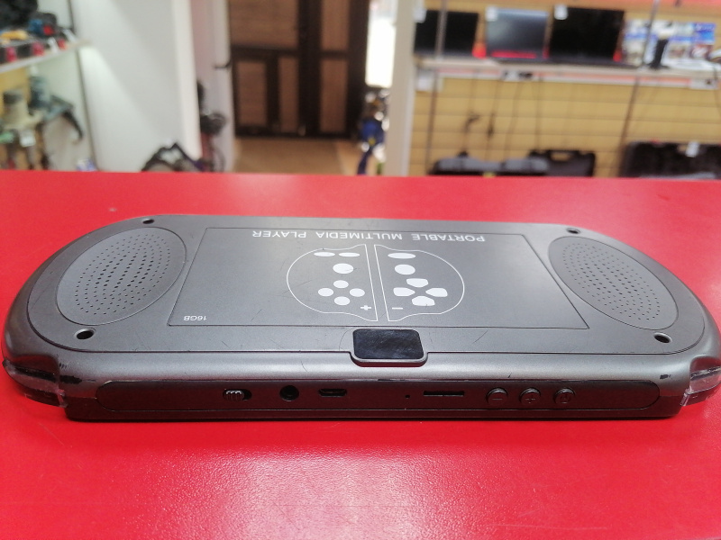 Игровая приставка  X12 PLUS